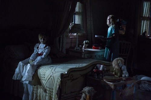 (L-R) The Annabelle doll and TALITHA BATEMAN as Janice in New Line Cinema's supernatural thriller ANNABELLE: CREATION, a Warner Bros. Pictures release. Photo: Justin Lubin, © 2017 WARNER BROS. ENTERTAINMENT INC. AND RATPAC-DUNE ENTERTAINMENT LLC.