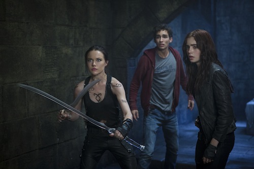 Isabelle Lightwood (Jemima West), Simon (Robert Sheehan) and Clary (Lily Collins) prepare to hold off the demons in Screen Gems THE MORTAL INSTRUMENTS: CITY OF BONES. PHOTO BY:	Rafy COPYRIGHT:	2013 Constantin Film International GmbH and Unique Features (TMI) Inc. All rights reserved. ALL IMAGES ARE PROPERTY OF SONY PICTURES ENTERTAINMENT INC. FOR PROMOTIONAL USE ONLY. SALE, DUPLICATION OR TRANSFER OF THIS MATERIAL IS STRICTLY PROHIBITED.