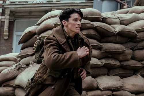 FIONN WHITEHEAD as Tommy in the Warner Bros. Pictures action thriller DUNKIRK, a Warner Bros. Pictures release. Photo credit: Melinda Sue Gordon.