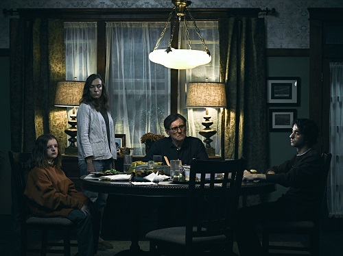 Milly Shapiro, Toni Collette, Gabriel Byrne, and Alex Wolff in Hereditary, photo by James Minchin, courtesy of A24.