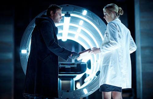 Aaron Eckhart as Adam and Yvonne Strahovski as Terra in I, Frankenstein.2014 Ben King / Lionsgate Films