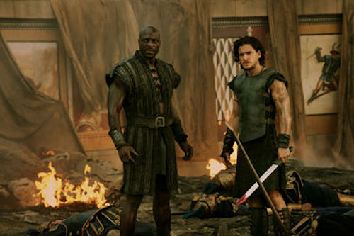 Adewele Akinnouye-Agbaje as Atticus and Kit Harington as Milo in Pompeii. 2014 George Kraychyk / Sony Pictures.