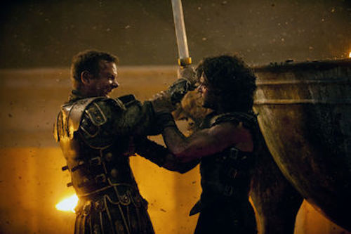 Kit Harington as Milo and Kiefer Sutherland as Corvus in Pompeii. 2014 George Kraychyk / Sony Pictures.