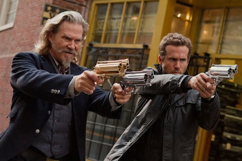 JEFF BRIDGES and RYAN REYNOLDS headline the 3D supernatural action-adventure R.I.P.D. as two cops dispatched by the otherworldly Rest In Peace Department to protect and serve the living from an increasingly destructive array of creatures who refuse to move peacefully into the afterlife. Photo Credit: Scott Garfield. Copyright: 2013 Universal Studios. ALL RIGHTS RESERVED.