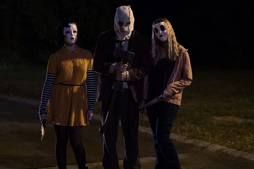 Pinup (Anna Shaffer), Man in the Mask (Damian Maffei) and Dollface (Emma Bellomy) are on the hunt for a killer night in THE STRANGERS: PREY AT NIGHT. Photo credit: Brian Douglas / Aviron Pictures.