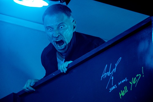 Begbie (Robert Carlyle) raging over toilet cubicle in TriStar Pictures T2: TRAINSPOTTING