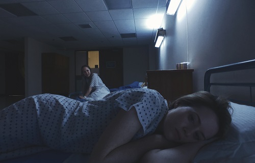 Juno Temple (left) stars as Violet and Claire Foy (right) stars as Sawyer Valentini in Steven Soderbergh's UNSANE, a Fingerprint Releasing and Bleecker Street release. Credit: Fingerprint Releasing / Bleecker Street.