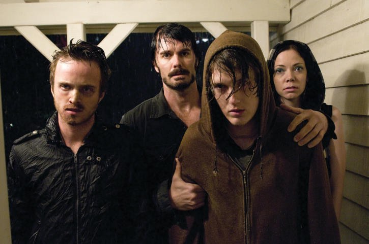 (L to R) Francis (AARON PAUL), Krug (GARRET DILLAHUNT), Justin (SPENCER TREAT CLARK) and Sadie (RIKI LINDHOME) knock on the Collingswood in The Last House on the Left