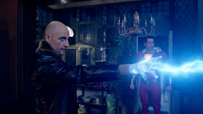 (l-r) MARK STRONG as Dr. Thaddeus Sivana and ZACHARY LEVI as Shazam in New Line Cinema’s action adventure “SHAZAM!,” a Warner Bros. Pictures release. Photo Courtesy of Warner Bros. Pictures.